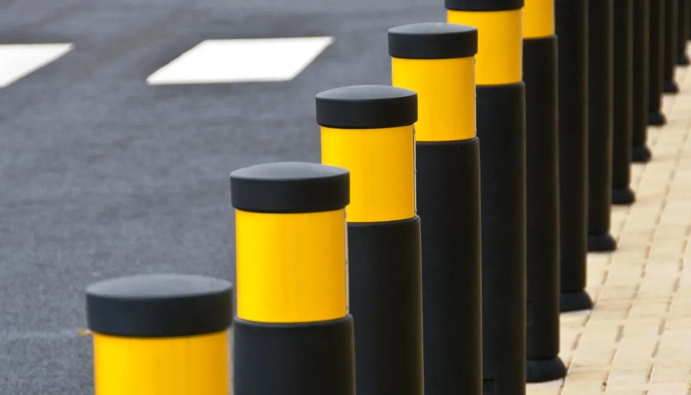 black and yellow bollards