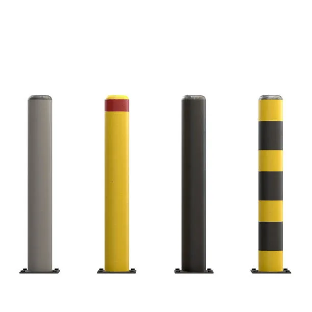 A set of four industrial safety bollards in different colors, grey, yellow with a red top, solid black, and yellow-and-black striped
